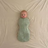 baby wearing 0.2 TOG sleep swaddle sack sage green