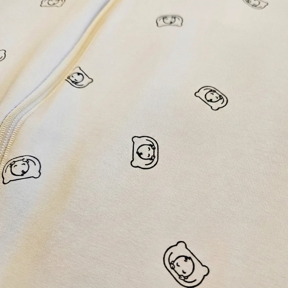 warm white fabric with sleep like goldilocks logo 1.0 TOG fabric