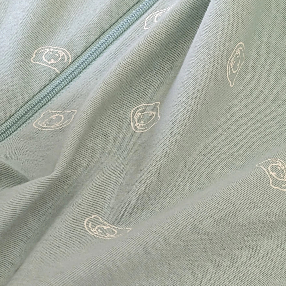 goldilocks sleep suit sage green fabric